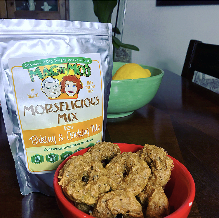 A red bowl full of mini donut treats in front of a bag of Mac-n-Mo's Morselicious Keto and Paleo-friendly Mix for Baking and Cooking.