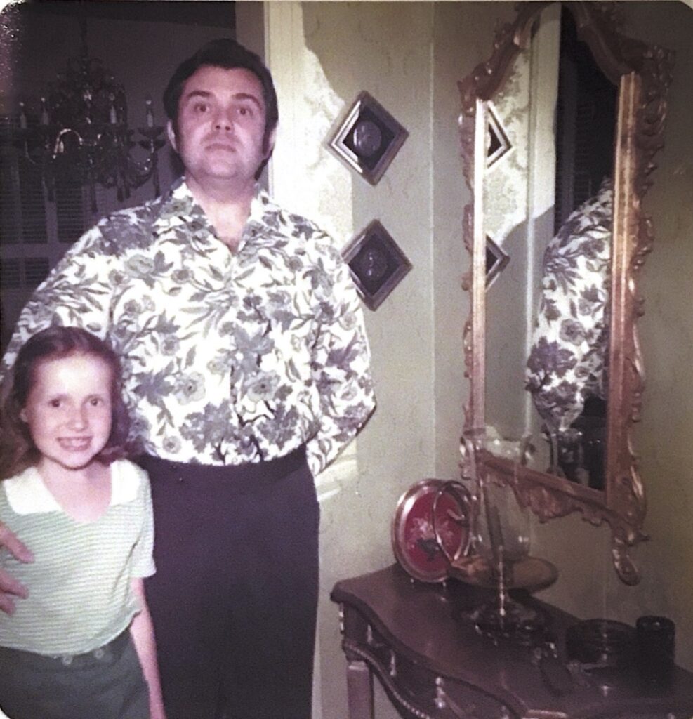 A young Mo with her dad, Mac