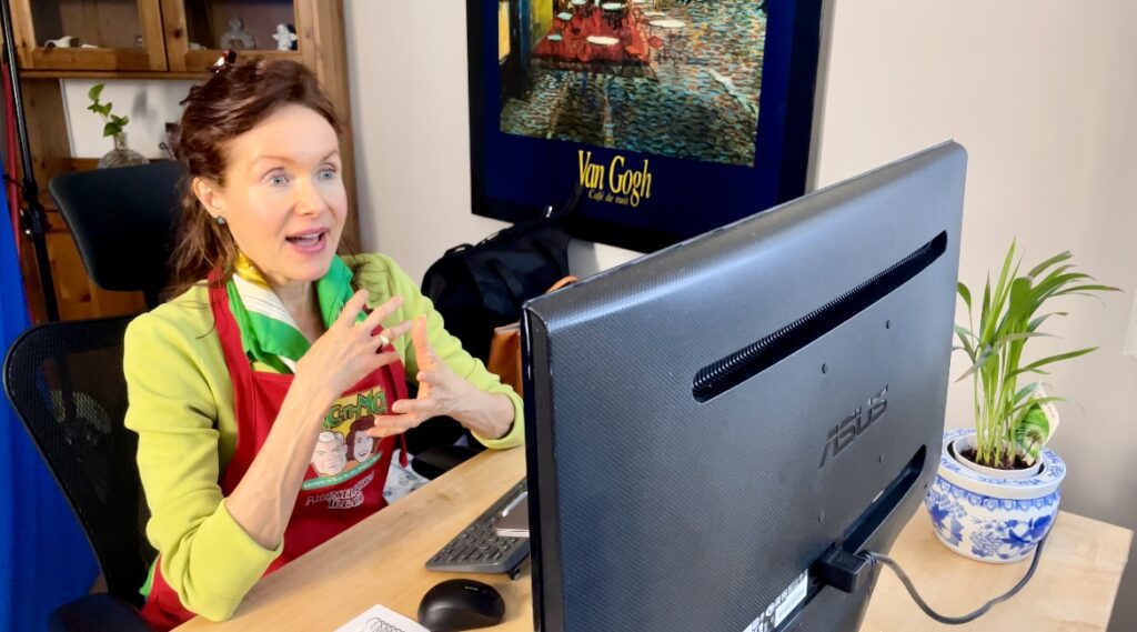 Mo at her desk teaching an online health coaching workshop.